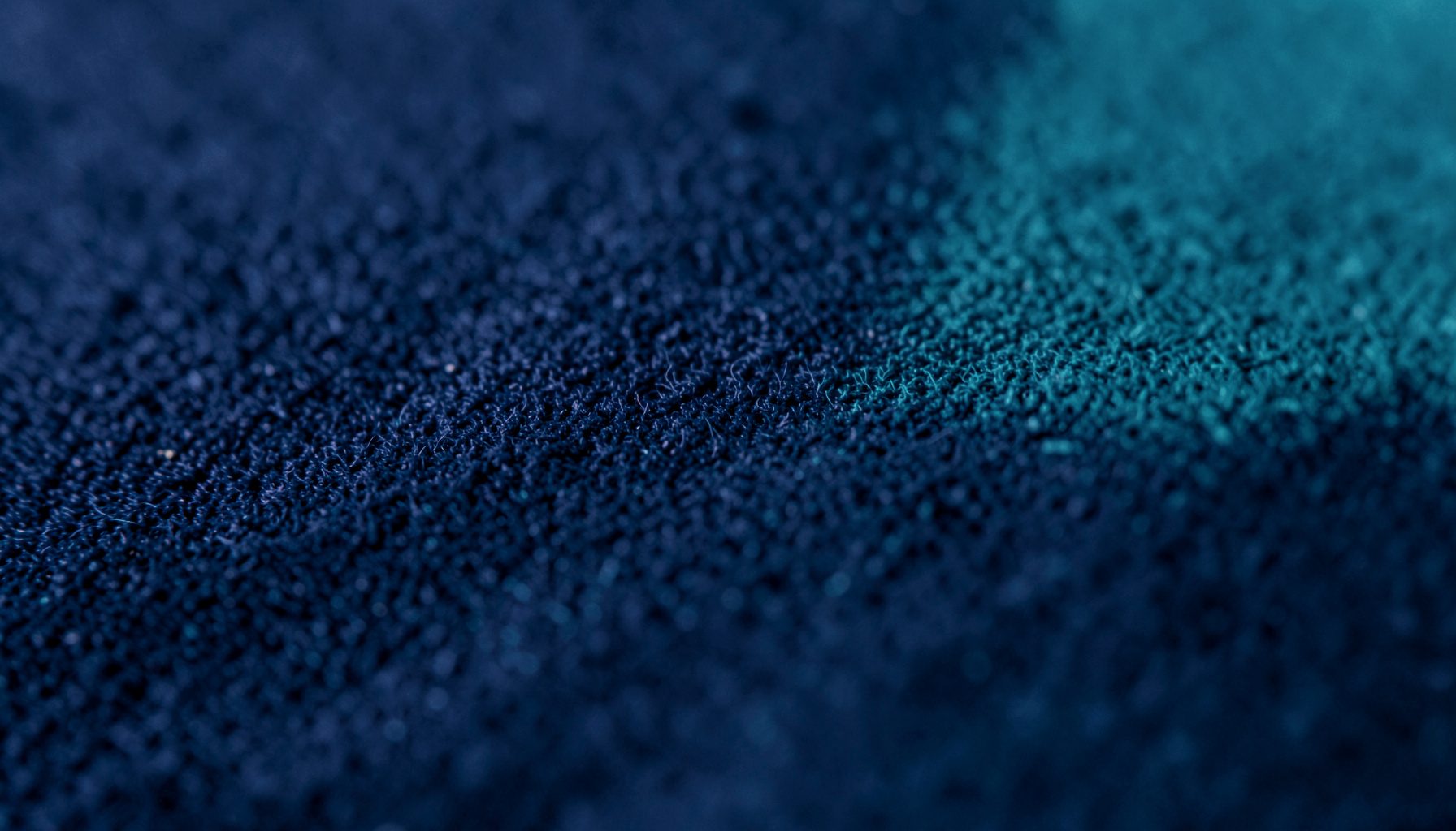 Soft abstract texture in deep navy and muted teal, calm and professional in mood